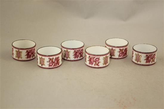 A set of six late 19th century enamel on copper circular napkin rings, 2in.